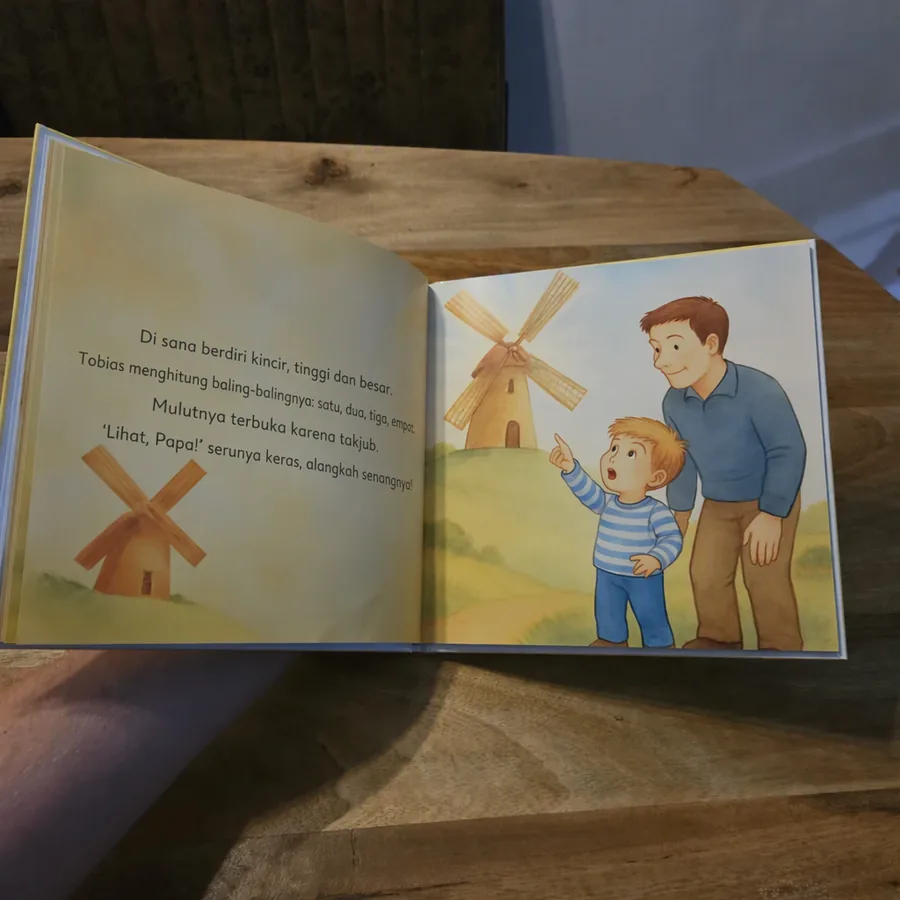Halaman dalam buku anak personalisasi dengan nama